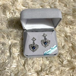 Earrings that have never been worn and they are wild pearle.